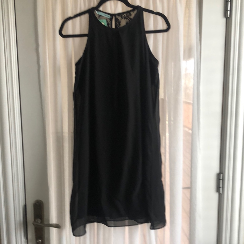 New with Tag. Maurice’s black sheath dress with lace back detail (small)
